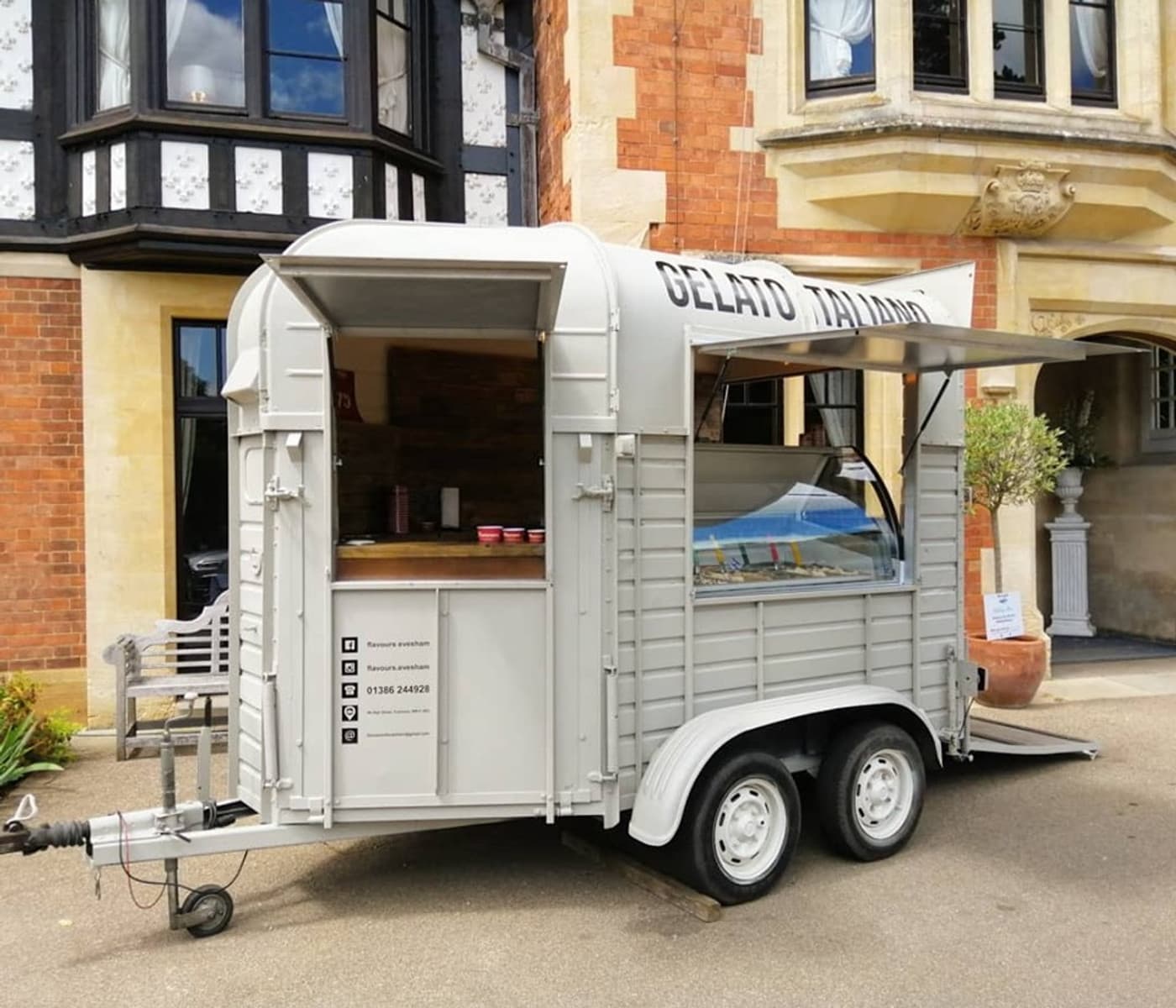 The vintage Rice Horsetrailer parked at a country house event